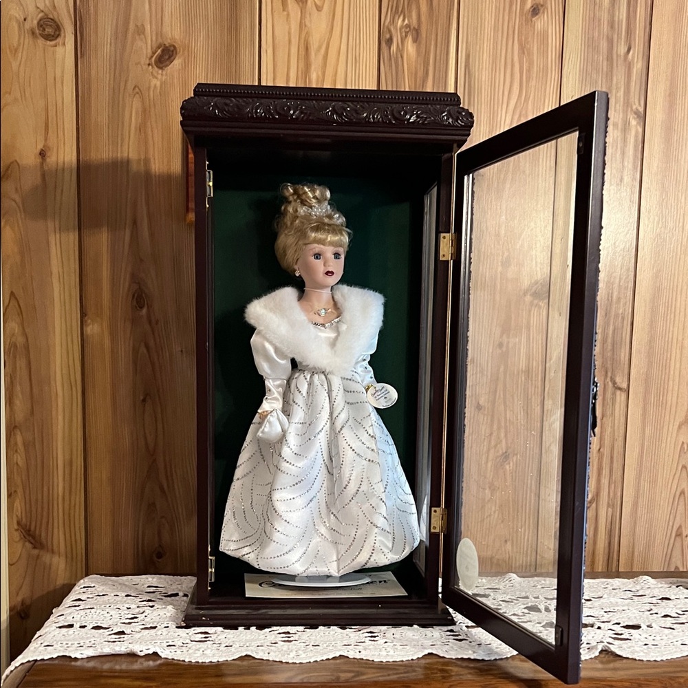 Elegant Porcelain Doll in White Gown